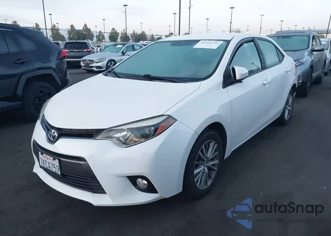 2015 Toyota Corolla Le Plus z USA, uszkodzony, nr VIN 5YFBURHE6FP256580